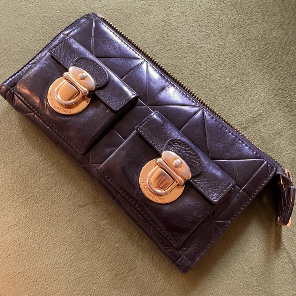 Black Marc Jacobs Clutch with gold clasps and zipper